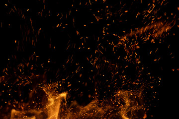 fire flame with sparks on black background.
