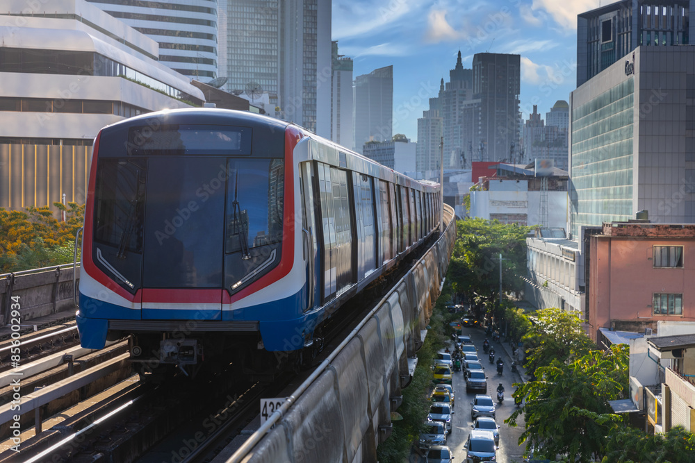 BKK BTS Bangkok Mass Transit System Sky train which is an elevated tram over the busy streets oh BKK Thailand BKK BTS Bangkok Mass Transit System Sky train which is an elevated tram over the busy streets oh BKK Thailand