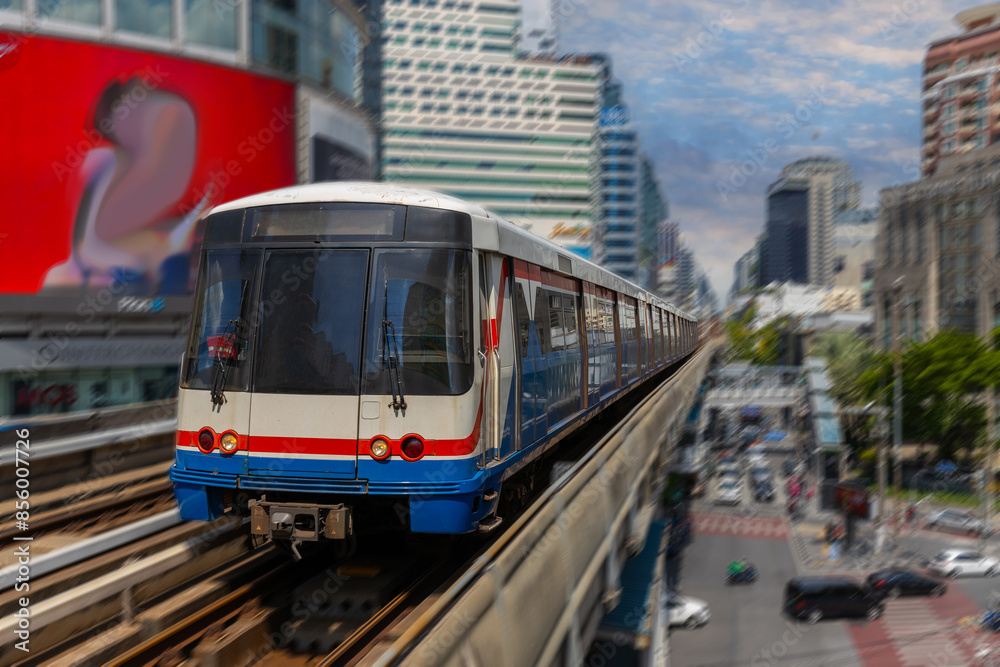 BKK BTS Bangkok Mass Transit System Sky train which is an elevated tram over the busy streets oh BKK Thailand BKK BTS Bangkok Mass Transit System Sky train which is an elevated tram over the busy streets oh BKK Thailand