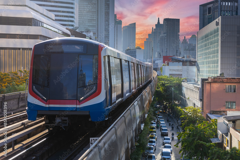 Obraz premium BKK BTS Bangkok Mass Transit System Sky train which is an elevated tram over the busy streets oh BKK Thailand 