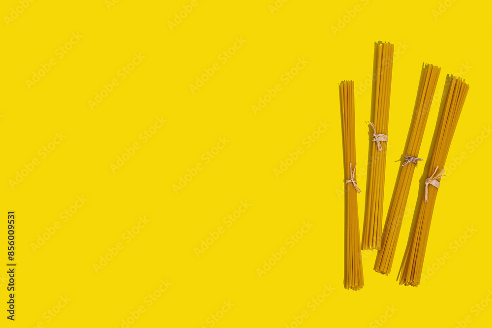 Pasta. Various kinds of uncooked pasta and noodles over wooden background Pasta. Various kinds of uncooked pasta and noodles over wooden background