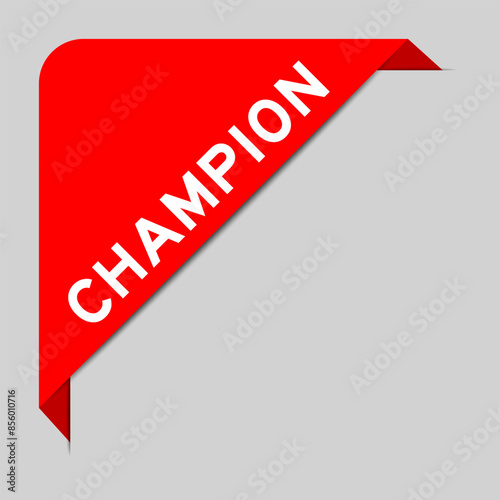 Red color of corner label banner with word champion on gray background