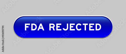 Blue color capsule shape button with word FDA rejected on gray background