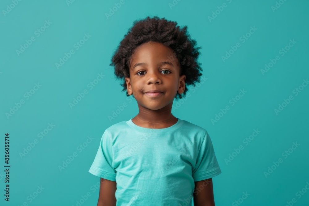Portrait of a little cute boy on turquoise background Portrait of a little cute boy on turquoise background