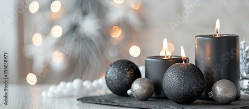 black burning candles with ...
