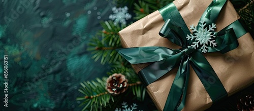 A gift with a green ribbon ...