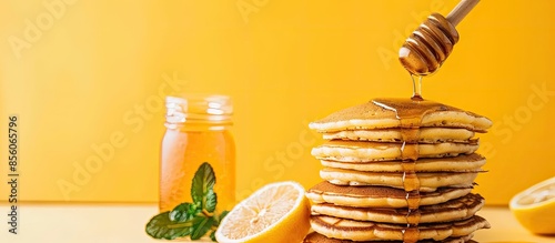 Pancakes and honey pastel b...