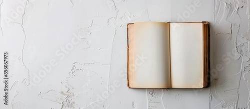 Open book on white backgrou...