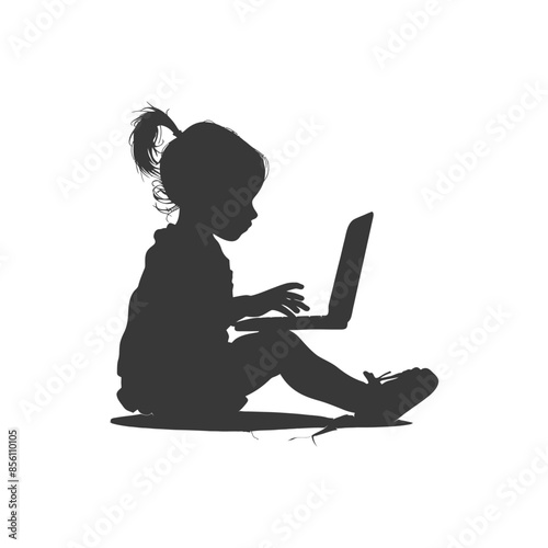 Silhouette of a Little Girl Typing on a Laptop, Seated on the Floor.