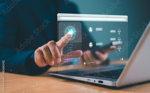 Chatbot artificial intelligent concept, digital customer service application. Man use computer mobile application with artificial intelligence, chat bot assistant online conversion to help business