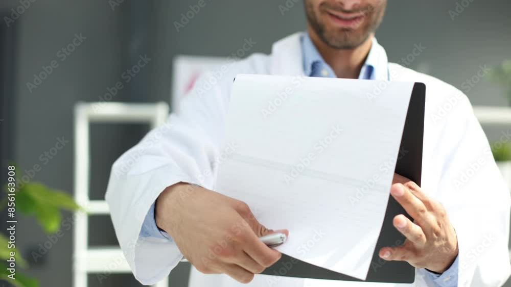 Medical worker looking at a patient's medical history close-up Medical worker looking at a patient's medical history close-up