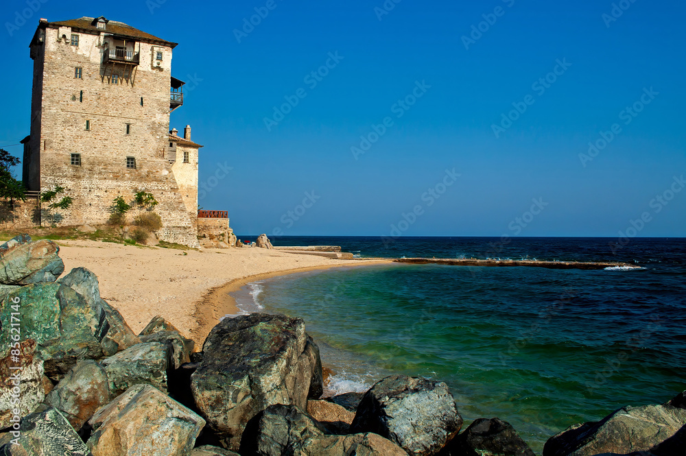 An old tower on the sea shore in the town of Ouranoupolis (Greece), called the Gate of Mount Athos An old tower on the sea shore in the town of Ouranoupolis (Greece), called the Gate of Mount Athos