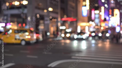 Defocused background with yellow cabs seen in traffic 