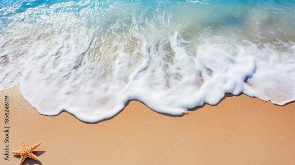 Obraz premium The beach is covered with golden sand