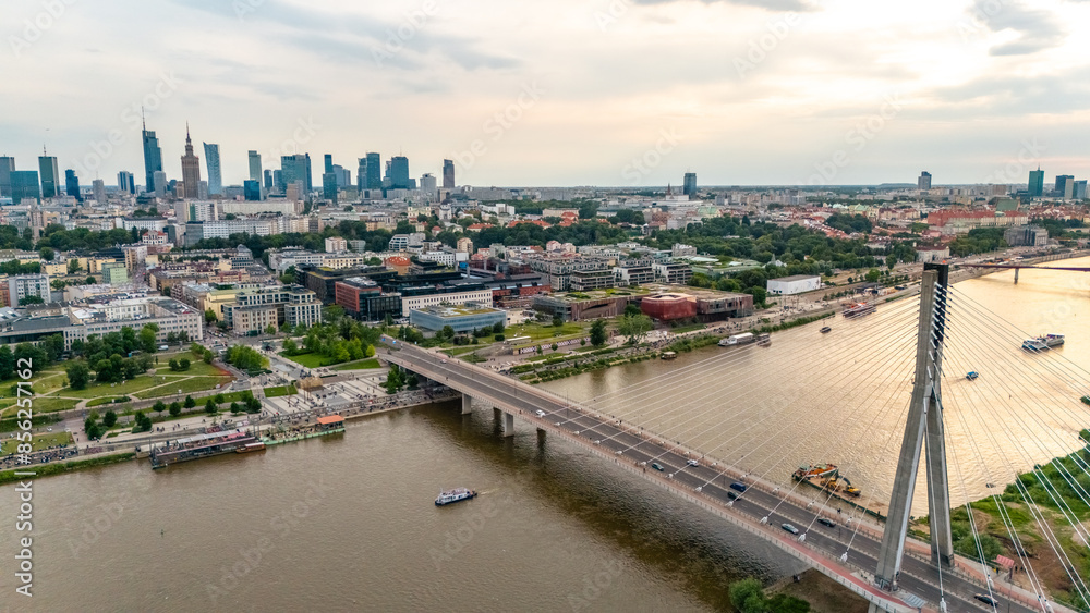 panoramic aerial view of Warsaw city at sunset in summer over the river