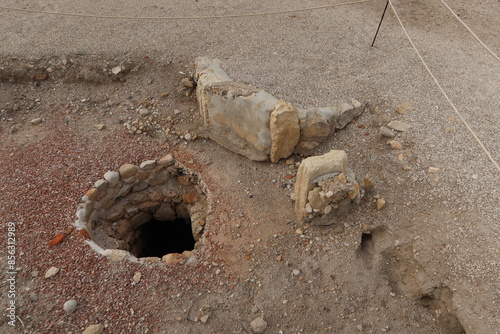 Ilici - La Alcudia, archaeological site. Elche, Alicante, Spain, June 19, 2024: Remains of the Iberian sewer system of Ilici - La Alcudia, archaeological site. Elche, Alicante, Spain photo