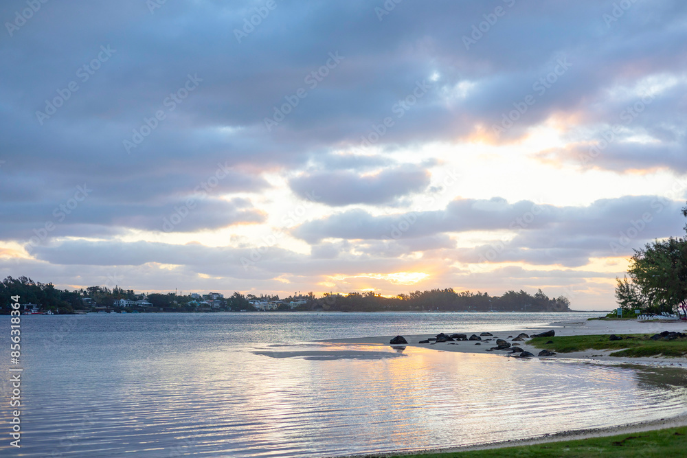 A stunningly picturesque beach on a cloudy day in Mauritius A stunningly picturesque beach on a cloudy day in Mauritius