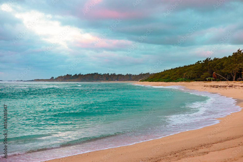 A stunningly picturesque beach on a cloudy day in Mauritius A stunningly picturesque beach on a cloudy day in Mauritius