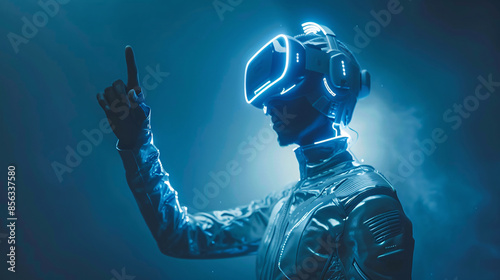 Man wearing a futuristic tech helmet and pointing finger in the blue glowing background photo