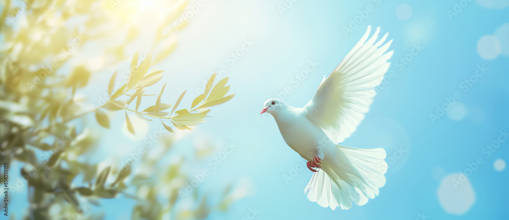 White dove is flying in a bright blue sky with an olive branch in its beak, symbolizing peace, hope, and new beginnings White dove is flying in a bright blue sky with an olive branch in its beak, symbolizing peace, hope, and new beginnings