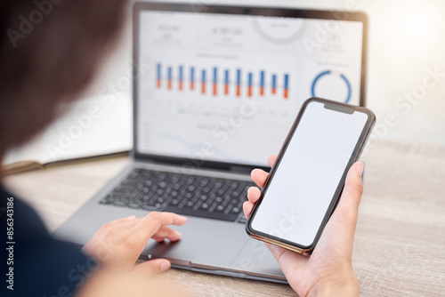 Hands, business woman and phone screen with laptop, graphs and internet for trading, stock market and investment. Charts, closeup and trader with mobile user, tech and digital app with mockup space