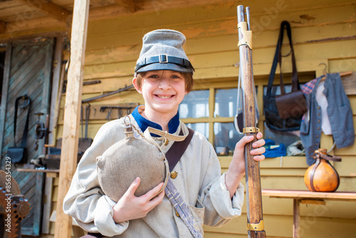Фотография child in historical costume of a South American Confederate soldier