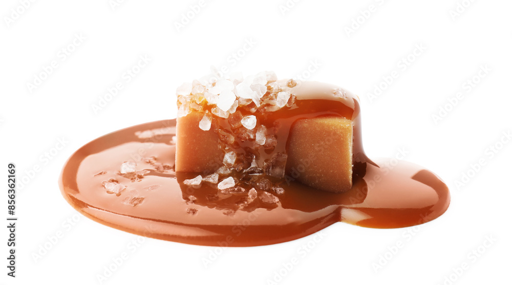 Yummy candy with caramel sauce and sea salt isolated on white Yummy candy with caramel sauce and sea salt isolated on white