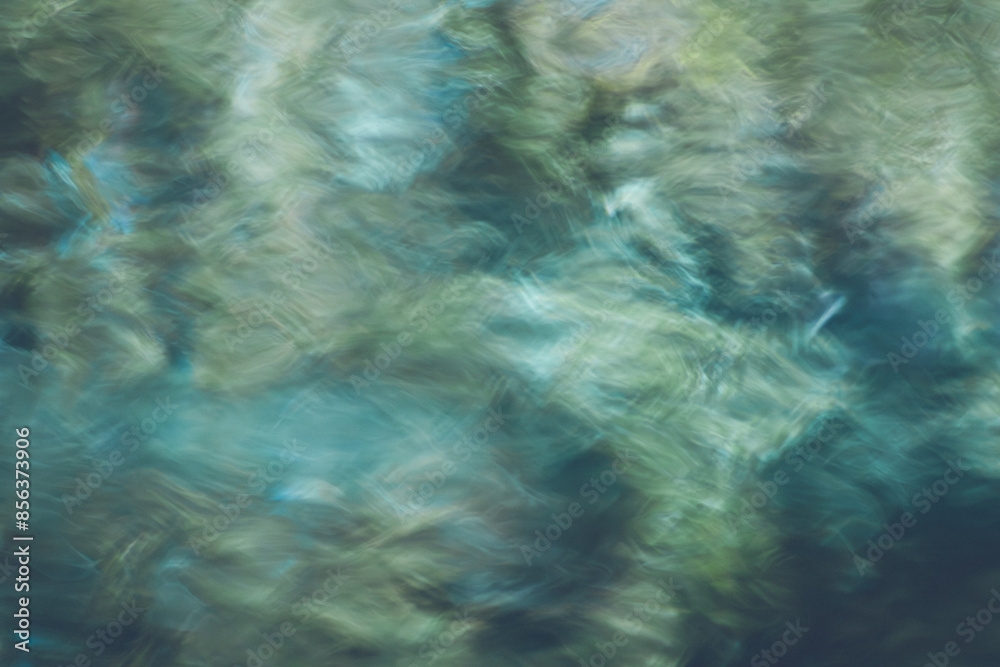 Fototapeta premium an abstract image of green water in the ocean
