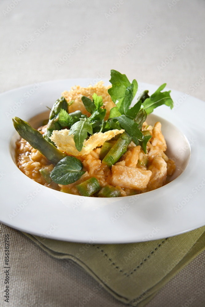 Asparagus risotto with pirarucu and fried cassava chips Asparagus risotto with pirarucu and fried cassava chips