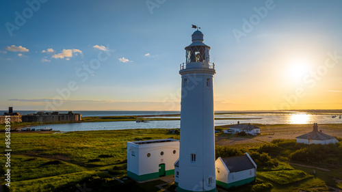 Sunset view of Hurst Point Lighthouse is located at Hurst Point in the English county of Hampshire photo