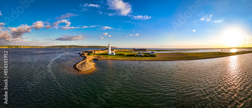 Sunset view of Hurst Point Lighthouse is located at Hurst Point in the English county of Hampshire photo