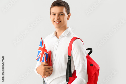 Teenage boy with UK flag, b...