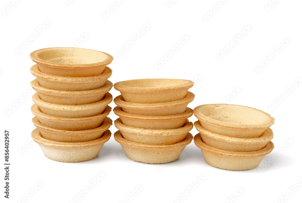Homemade tartlets isolated on white background Homemade tartlets isolated on white background