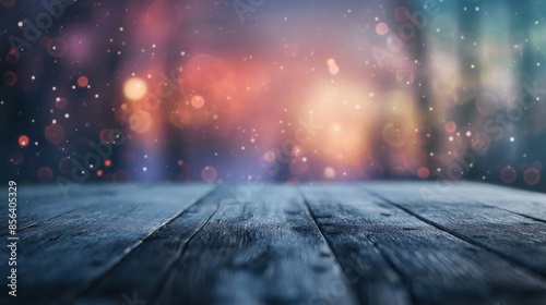 a close up of a rustic empty wooden table with blurred sunset over snow forest background photo
