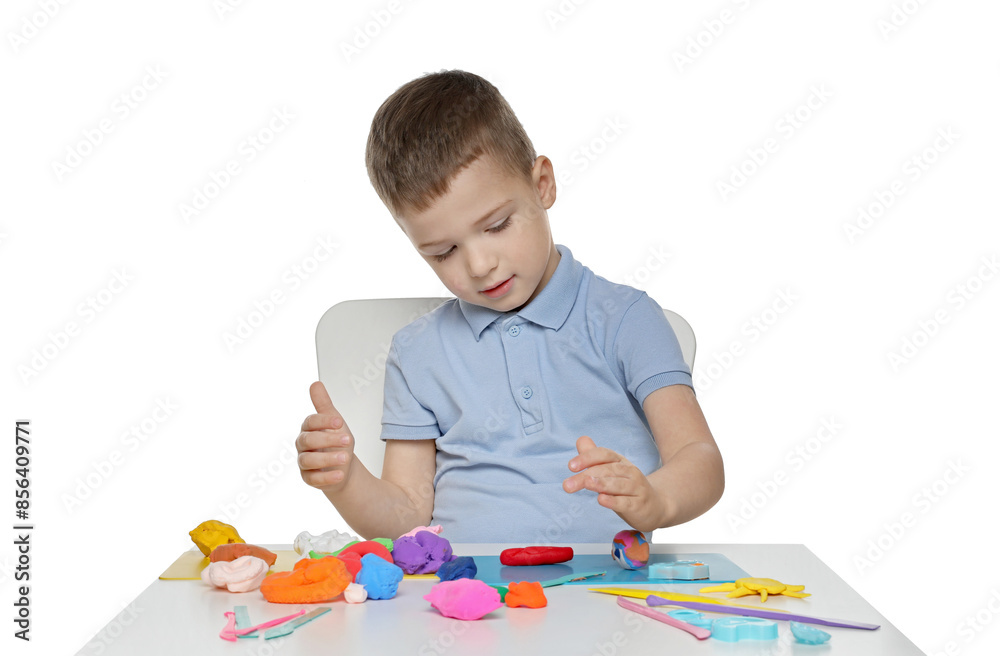 Little boy sculpting with play dough at table on white background Little boy sculpting with play dough at table on white background