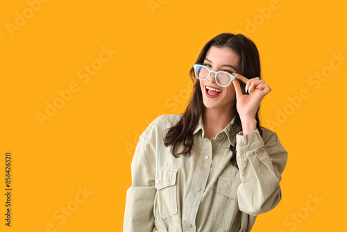 Happy smiling young woman i...