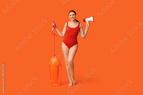 Female lifeguard with rescu...