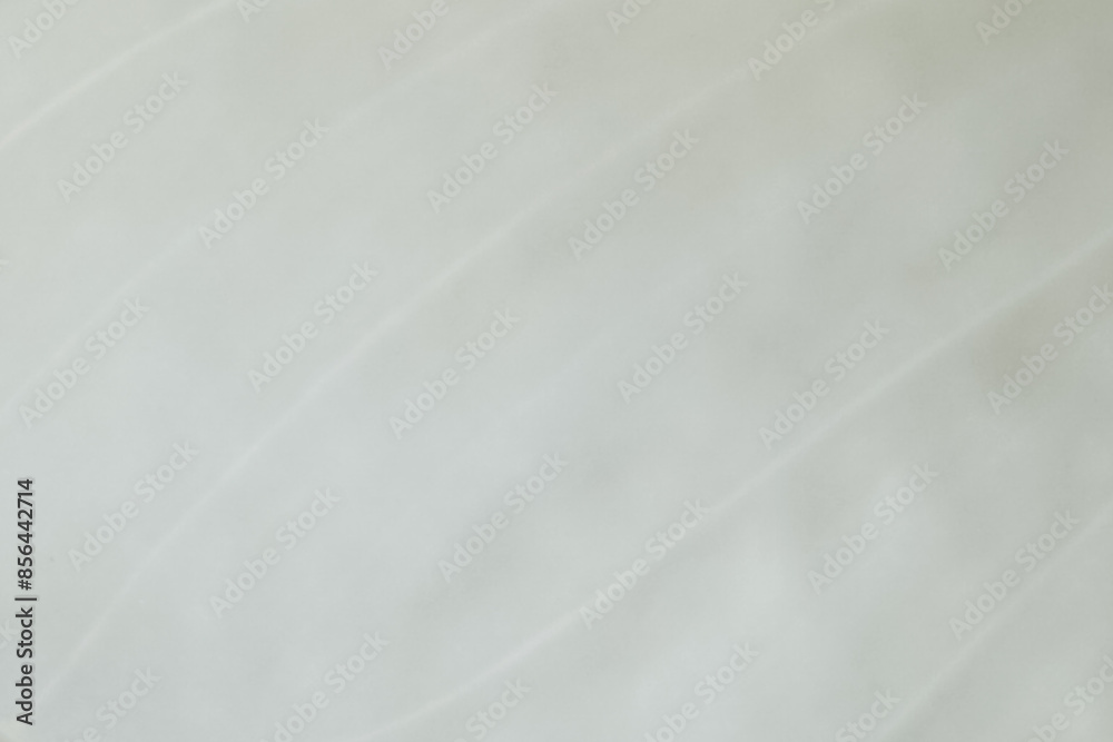 Obraz premium Simple white background with smooth curved lines