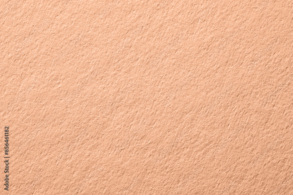 Peach fuzz color paper, closeup. Trendy shade of 2024 year Peach fuzz color paper, closeup. Trendy shade of 2024 year
