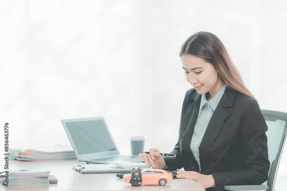 female car salesperson
work at desk
with laptop, car model, car sales concept and insurance female car salesperson
work at desk
with laptop, car model, car sales concept and insurance