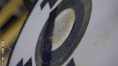 mallet hitting the drum and vibrating drumhead