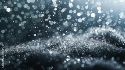 Image of sparkling snowflakes and bokeh lights.