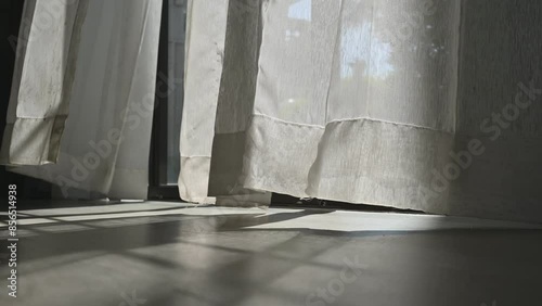 The curtains are moving, window, white fabric
