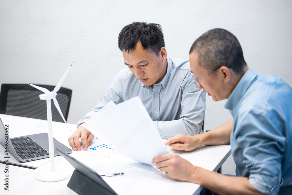 businessman coworking in new energy company businessman coworking in new energy company