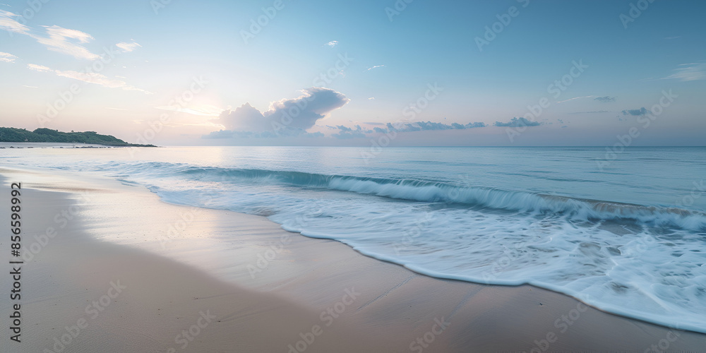 Serene Beach at Sunrise with Gentle Waves