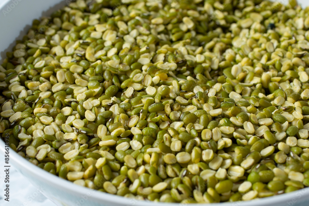 A closeup of a bowl of green lentils. A closeup of a bowl of green lentils.