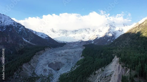 Flight over Raikot Glacier toward Nanga Parbat Mountain photo