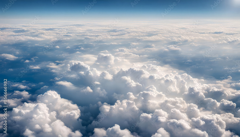Aerial view above white fluffy clouds Aerial view above white fluffy clouds