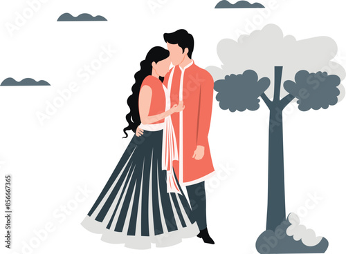 Indian couple is posing lovingly outdoors.