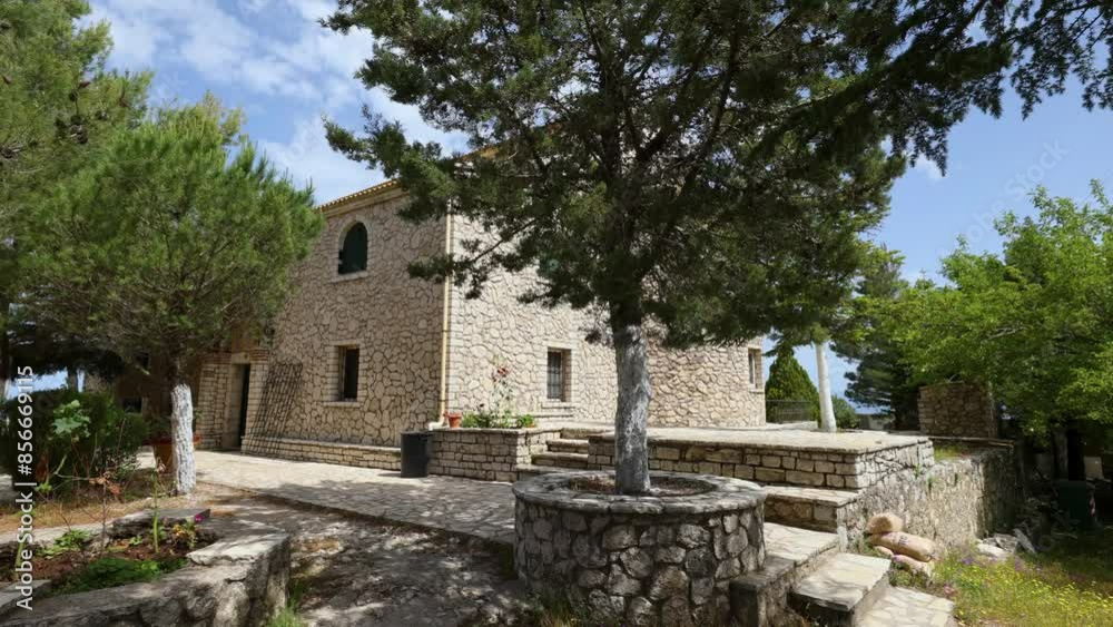 Tourists visit the Monastery of Pantokrator the highest point of Corfu, Greece Tourists visit the Monastery of Pantokrator the highest point of Corfu, Greece